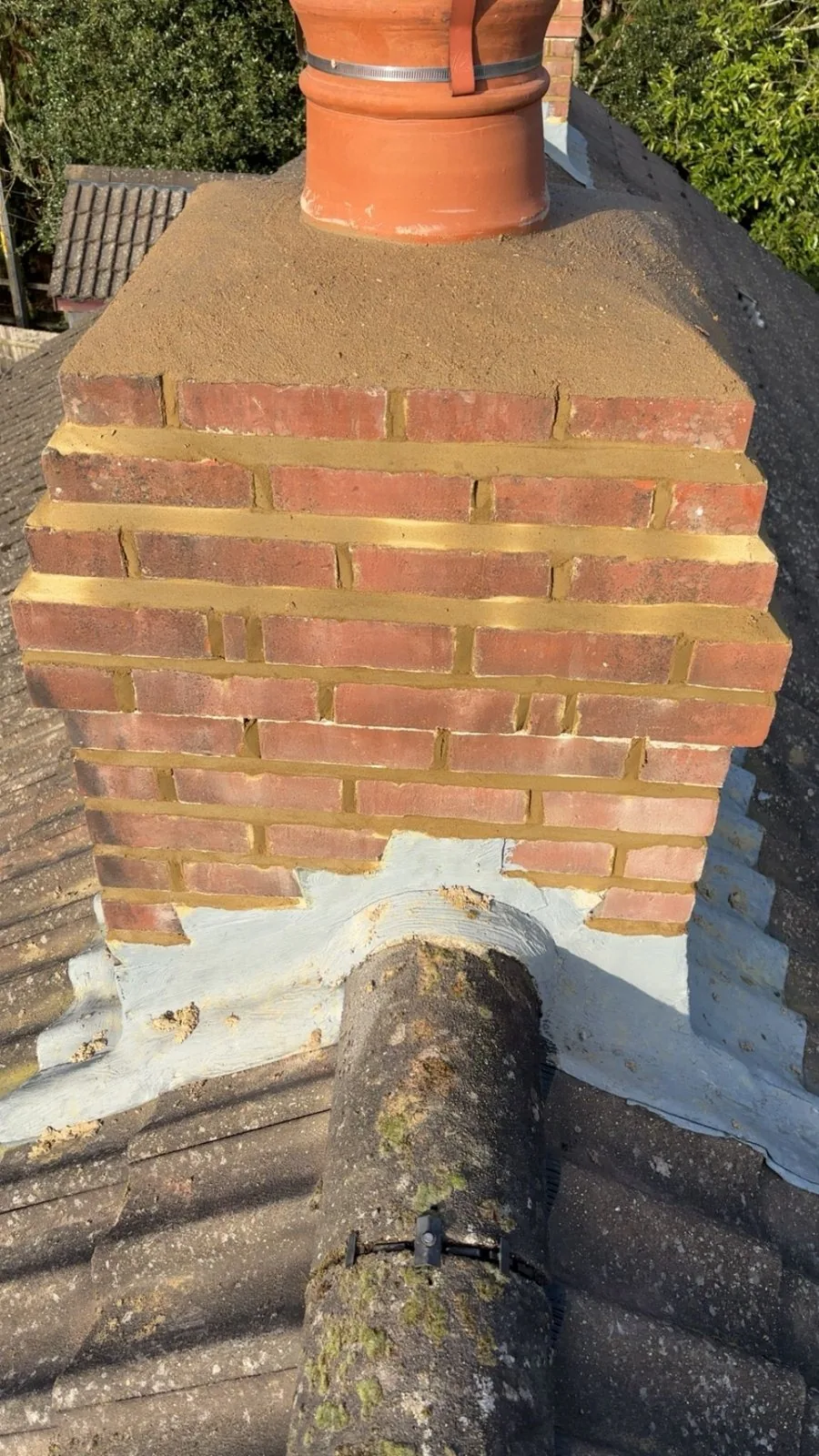 Rebuilt and repointed chimney stack with new flaunching and lead flashing