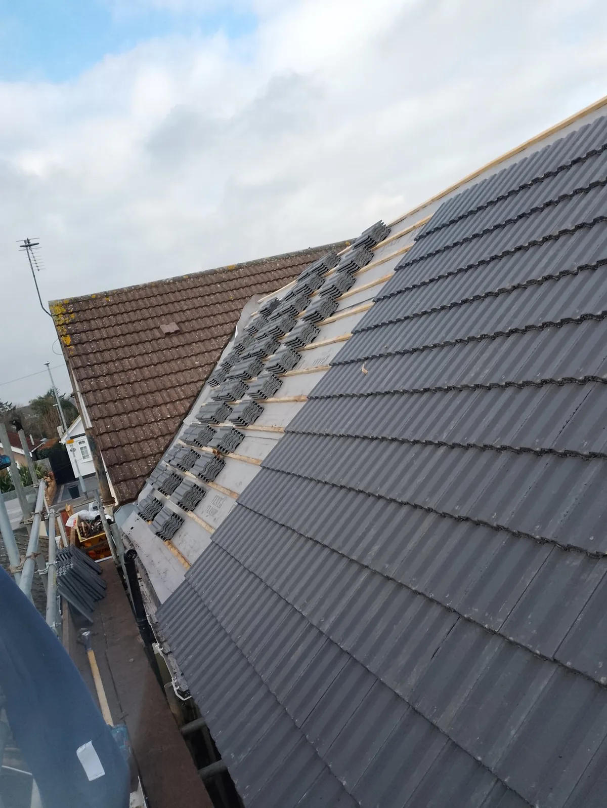 Re-roof with membrane and battens prepared with grey concrete tiles ready to lay
